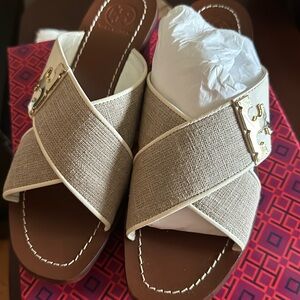 Women’s Tory Burch, slightly worn cross top wedge heel cream a tan 7.5